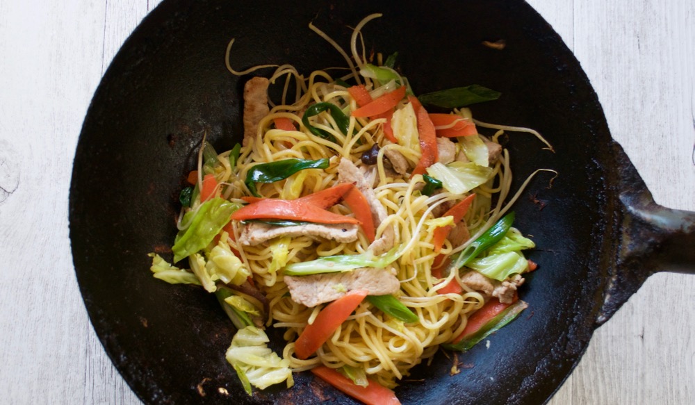 Yakisoba cooked in a wok.
