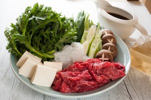 One of the most popular Japanese hot pot dishes, sukiyaki (すき焼き) is great for get-together with friends and family. Cooking thinly sliced beef, tofu and vegetables in sweet soy sauce flavour over a portable cooktop on the table is so much fun. It is quick to prepare and so tasty.