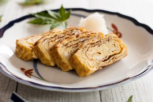 The typical egg dish in Japanese cuisine, dashimaki tamago (出し巻き卵, Japanese rolled omelette) is made by rolling thin layers of egg in the frypan. The beautiful layers of the egg when sliced, and the sweet dashi flavour make this omelette so unique.