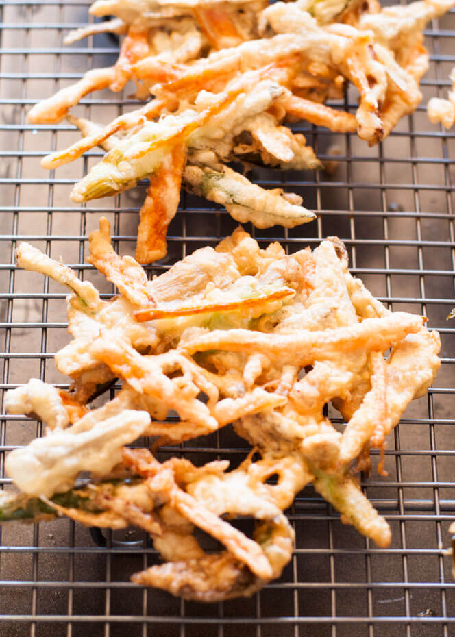 Kakiage is a type of tempura made with a variety of vegetable strips, often with seafood. This is a popular home cooking dish as it uses leftover vegetables to clean up the fridge for the week.