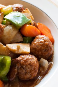 Sweet and sour pork usually uses cubed pork but this is a meatball version of sweet and sour pork. Onions in the meatballs give the meat more flavour and the sauce is not as strong as original Chinese sweet and sour pork.