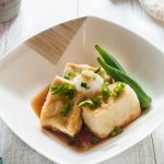 Agedashi Tofu (or Agedashi Dofu) is one of the a-la-carte dishes you always find on the menu at Japanese restaurants. It is delicate and simple but so yummy. The sweet soy sauce-based dashi goes so well with deep fried tofu.