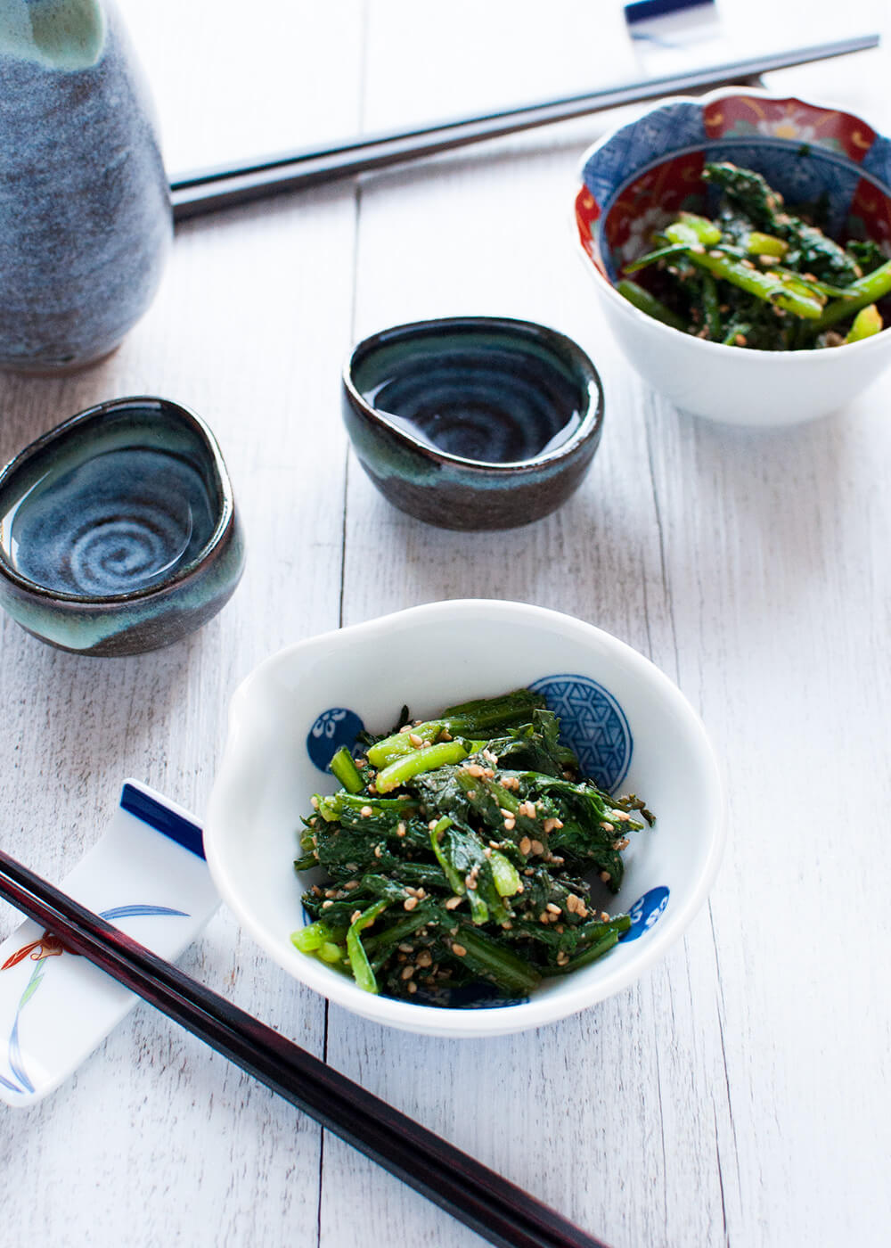 Goma-ae (胡麻和え) is a side dish made with vegetables and sweet sesame dressing. This is a pure vegetarian dish and very quick to make. The dressing has the full flavour of sesame with a little bit of sweetness and it goes so well with the slight bitterness of chrysanthemum leaves. 
