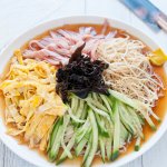 Hiyashi chūka is made with cold Chinese-style egg noodles, with sweet vinegar sauce and topped with vegetables, egg and ham. It is a great dish to have on a hot summer day.