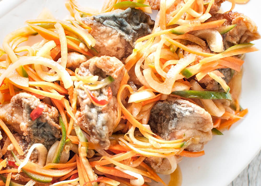 When bite size pieces of deep fried fish are marinated in slightly sweet vinegar and soy based sauce with plenty of shredded vegetables, it transforms the fish into something totally different.