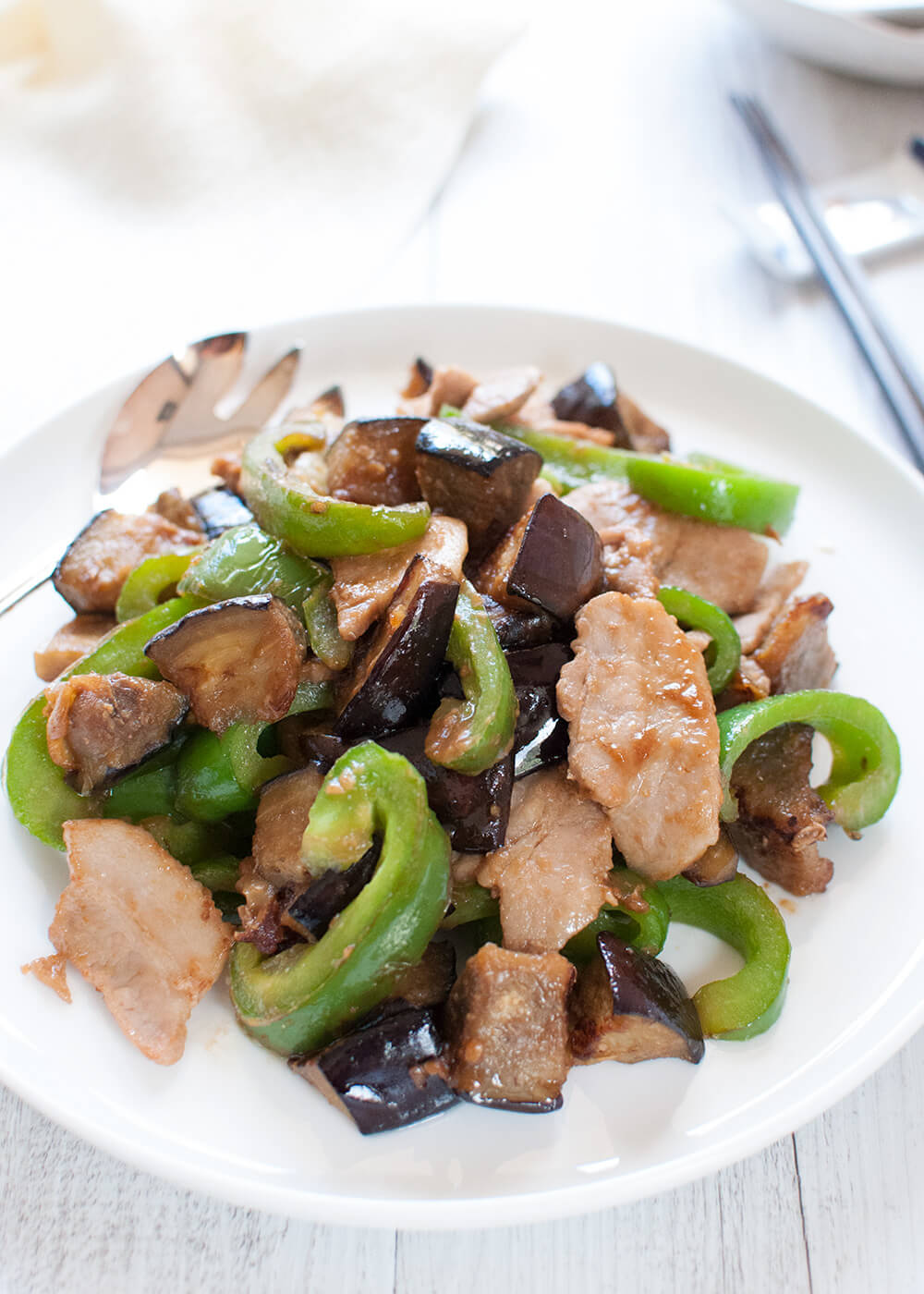 This is a quick side dish. Eggplant goes so well with miso and green capsicum adds bright colour to the dish. My recipe uses thinly sliced pork but you can make it without meat. Then it becomes a vegetarian dish.