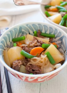 I call it stew but Japanese Meat and Potato Stew is nowhere near the Western style stew. The cooking liquid is based on the usual Japanese flavours of slightly sweetened soy sauce with dashi stock, but is not thickened.