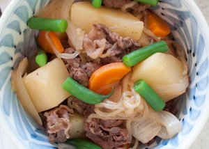 I call it stew but Japanese Meat and Potato Stew is nowhere near the Western style stew. The cooking liquid is based on the usual Japanese flavours of slightly sweetened soy sauce with dashi stock, but is not thickened.