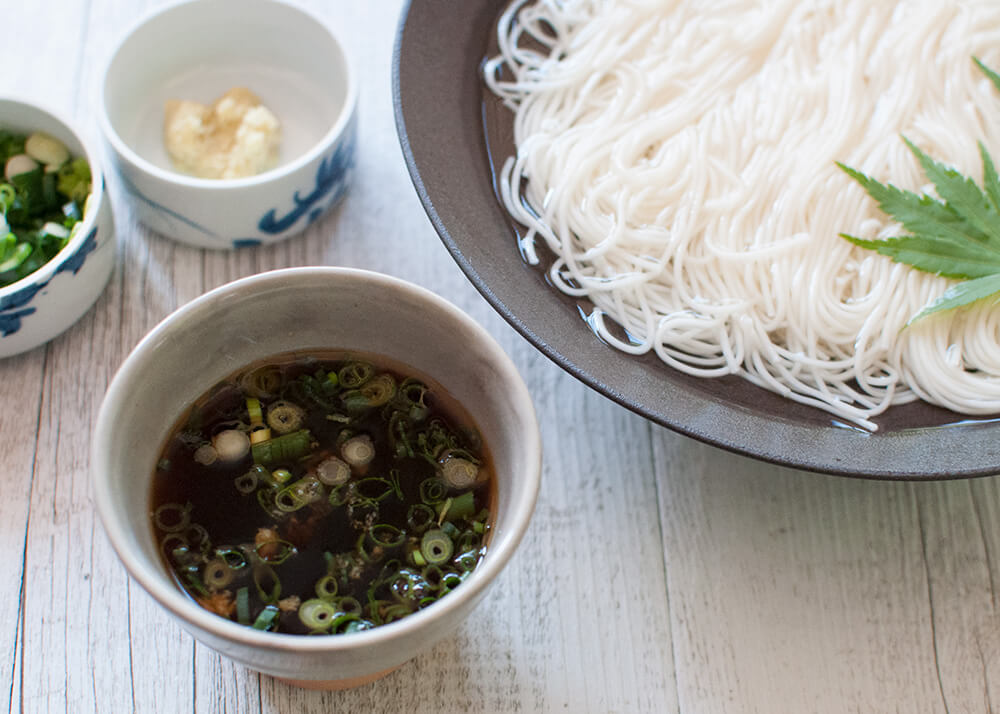 Somen (or sōmen) is a very thin noodles served cold which makes it a perfect summer dish. Noodles are served in chilled water and the dipping sauce is also chilled.