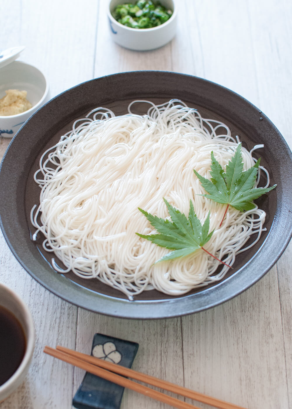 Somen (or sōmen) is a very thin noodles served cold which makes it a perfect summer dish. Noodles are served in chilled water and the dipping sauce is also chilled.