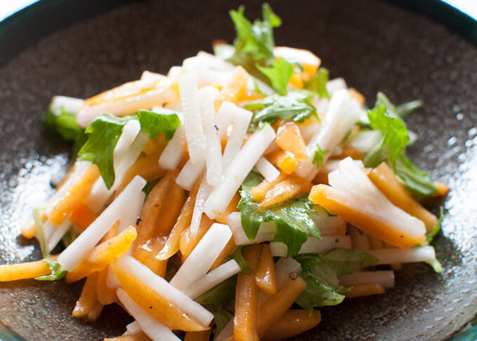 Zoomed in photo of Persimmon and Daikon Salad.