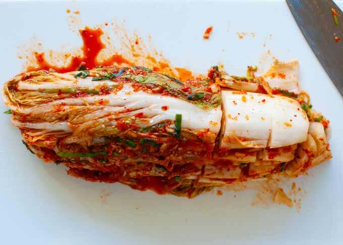 to serve kimchi, cut the marinated Chinese cabbage leaves to 4cm/1½" long crosswise.