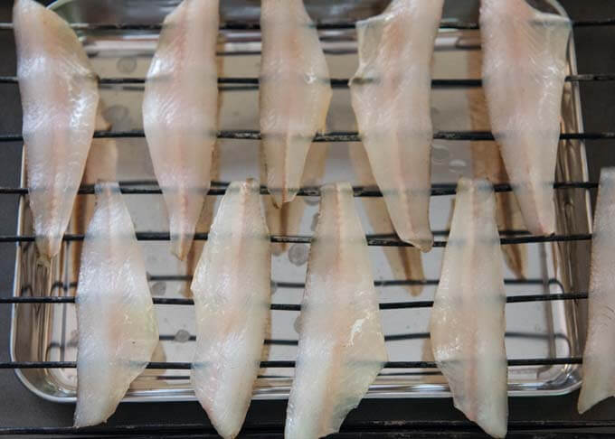 Semi Dried Whiting Fillets on a rack.