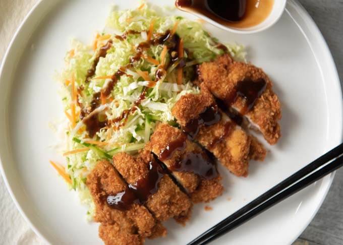 Top-down photo of Japanese Chicken Cutlet covered with sauce.