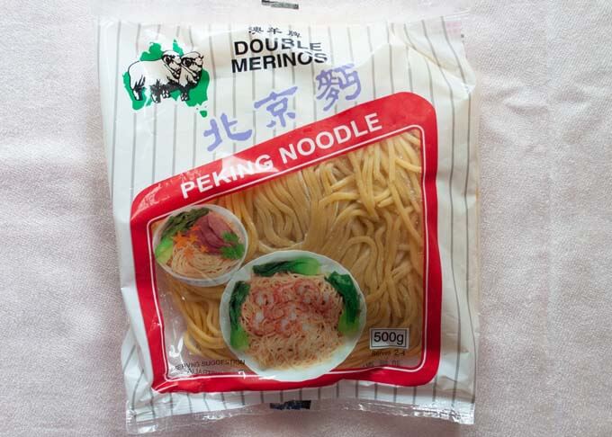 A pack of yellow noodles used for Yakisoba.