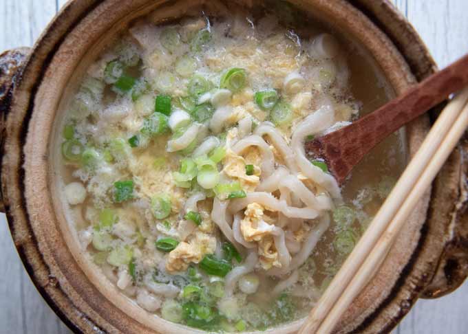 Udon noodles with egg and chopped shallots with the broth leftover from Chanko Nabe.