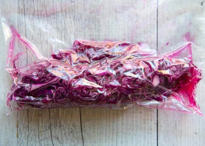 Pickling red cabbage in a zip lock bag.