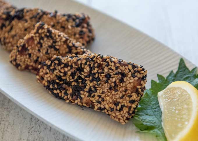 Rikyū-age Salmon coated in black and white mixed sesame seeds.