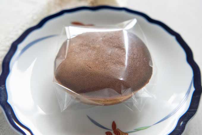 A Dorayaki wrapped in a celopahn, like the one sold at shops.