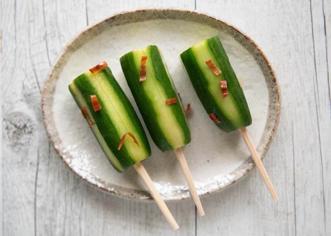 Shiro Dashi Pickled Cucumbers on sticks.