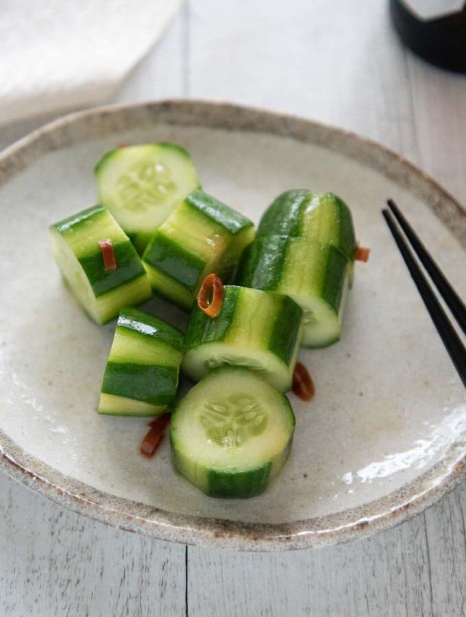 Shiro Dashi Pickled Cucumbers served on a plate.