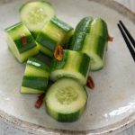 Shiro Dashi Pickled Cucumbers served on a plate.