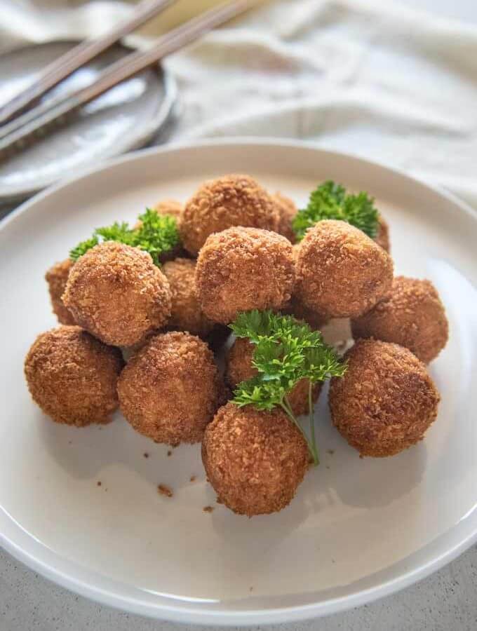 Hero shot of Pumpkin Croquettes piled on a plate.