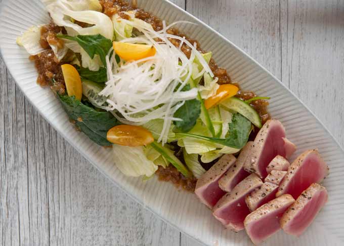 Top-down photo of Tuna Sashimi salad.