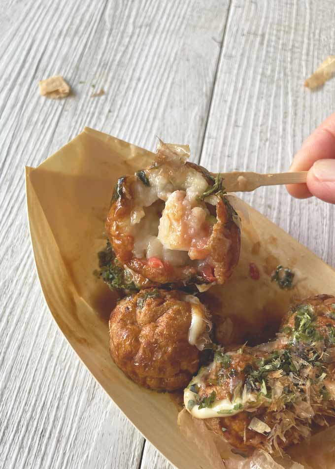 Zoomed-in photo of a Takoyaki showing the inside of the ball.