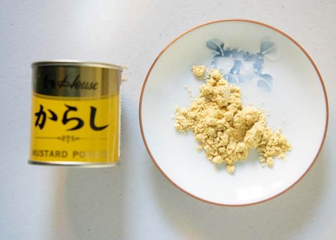 Showing Japanese mustard, Karashi in powdered form and a little tin of the karashi powder.