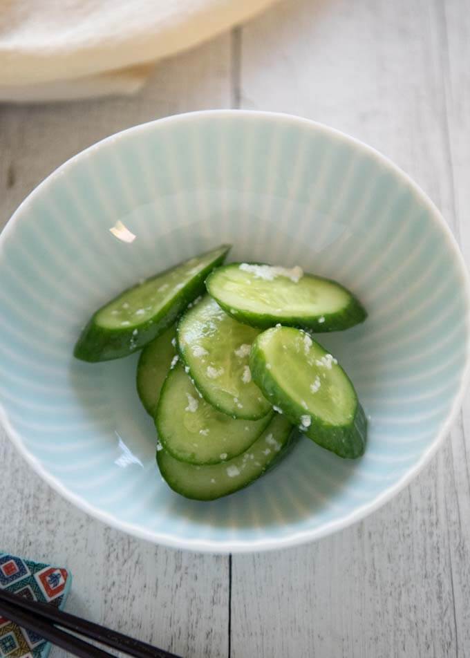 Hero shot of Sliced Cucumbers Pickled in Shio Kōji served in a bowl.
