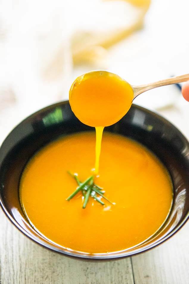 Showing the consistency of the Japanese-style Pumpkin Soup., dribbling from the spoon.