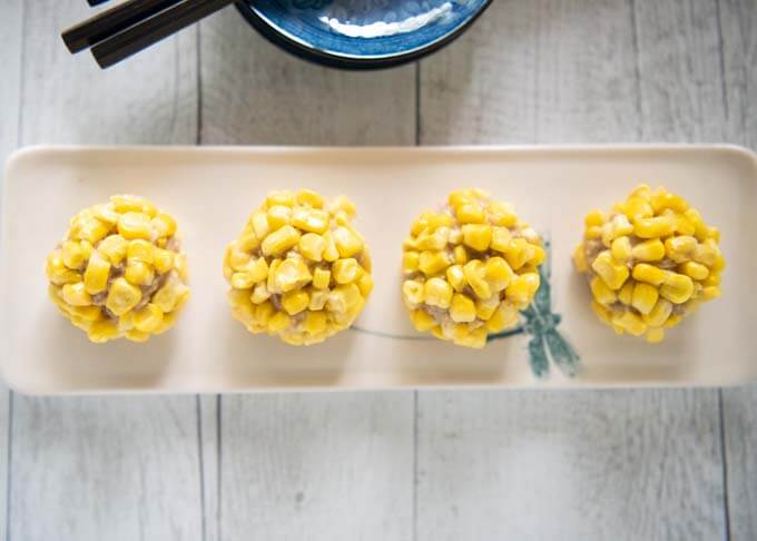 top-down photo of Steamed Pork Meatballs with Corn.