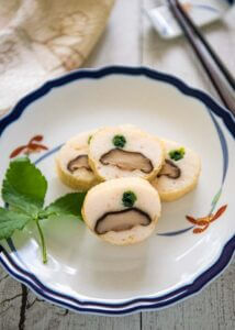 Hero shot of Steamed Fish Paste with Mushrooms Wrapped in Tofu Skin.