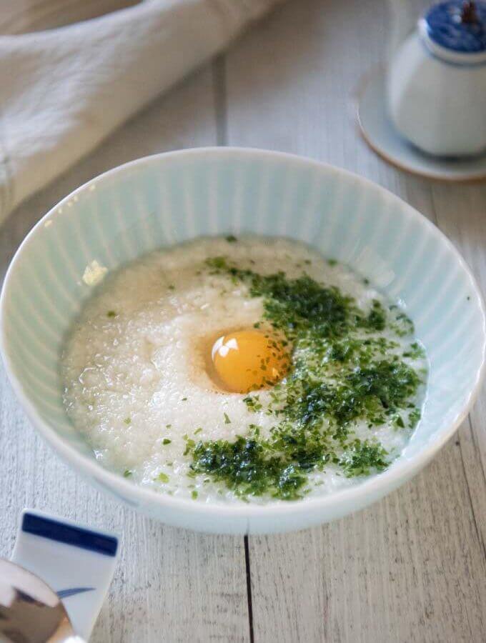 Hero shot of Quail Egg on Grated Mountain Yam served in a bowl.