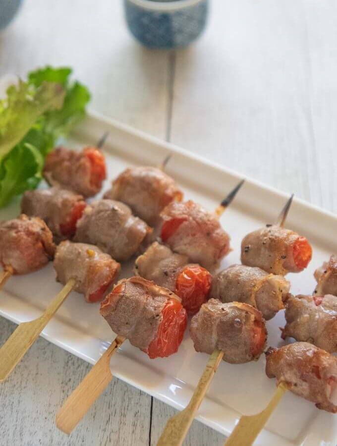 Hero shot of Grilled Mini Tomatoes Wrapped in Pork.