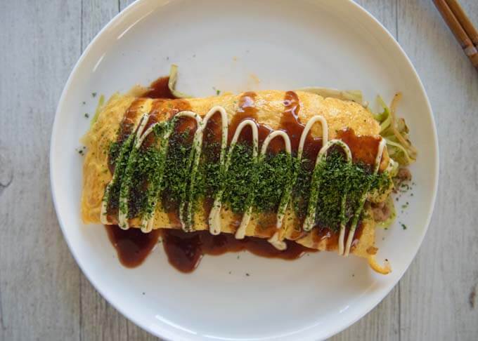 Top-down photo of Pork and Cabbage Omelette (Tonpeiyaki).