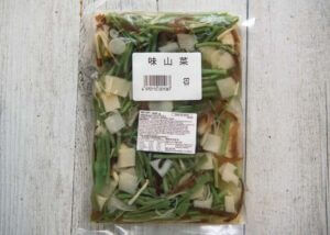 A pack of pre-boiled mountain vegetables in water.