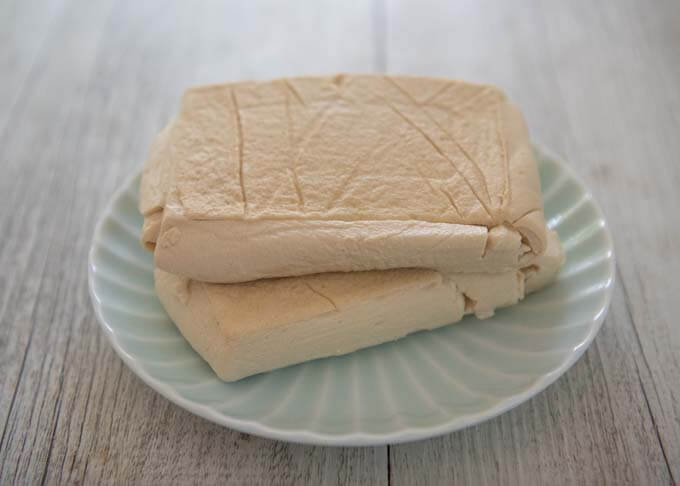 Momen tofu after pressed to reduce water.