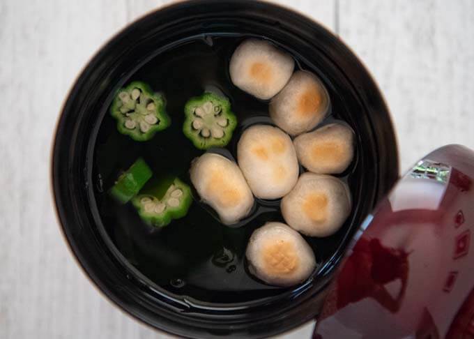 Clear Soup with Wheat Gluten and Wakame Seaweed using ball-shaped yakifu.
