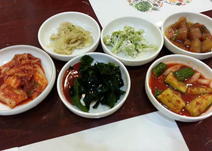 Banchan with various small vegetables dishes