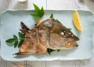 Top-down photo of Grilled Kingfish Head.