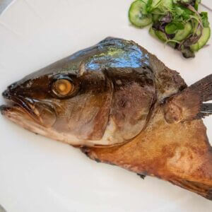 Hero shot of Baked Kingfish Head with Soy Glaze (Kingfish Tsukeyaki).