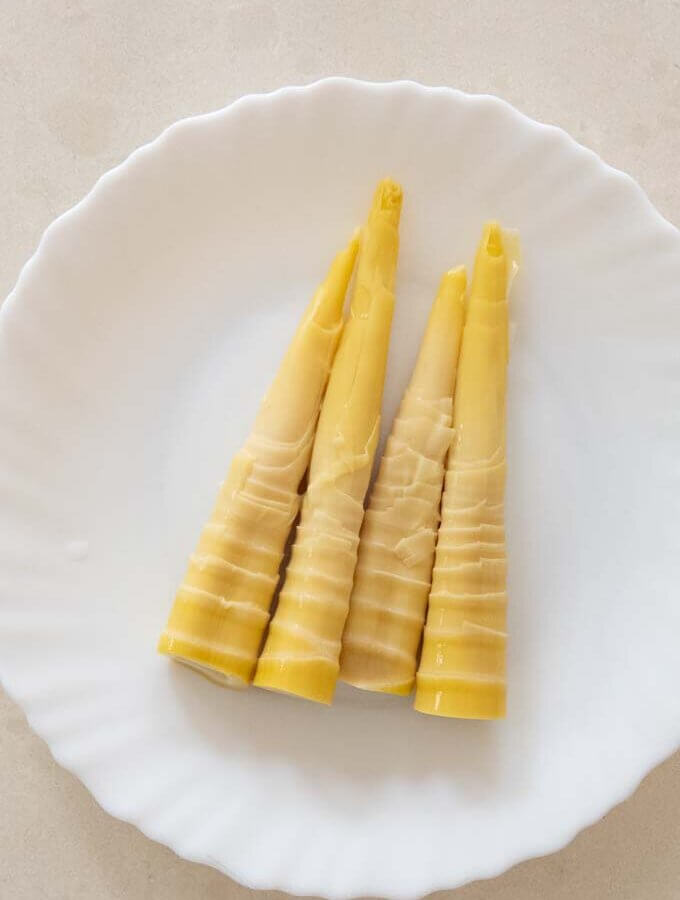 Boiled bamboo shoots on a plate, ready to use.