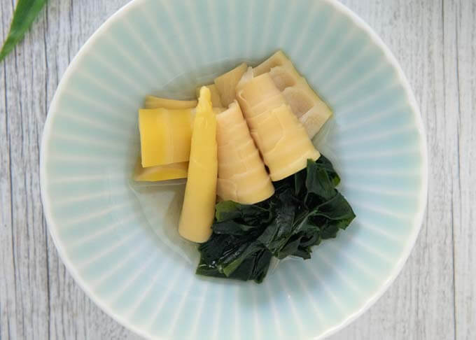 Top-down photo of simmered Bamboo Shoots with Wakame Seaweed.