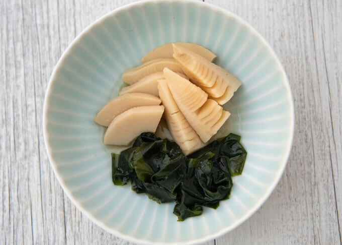 Simmered Bamboo Shoots with Wakame Seaweed using a thick Japanese bamboo shoot.
