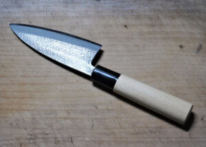 Japanese deba knife to fillet and prepare whole fish.