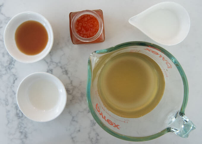 Ingredients for Gin-an and ikura in a jar.