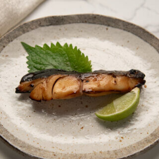 Hero shot of Yūan-style Grilled fish (Yūan Yaki fish).