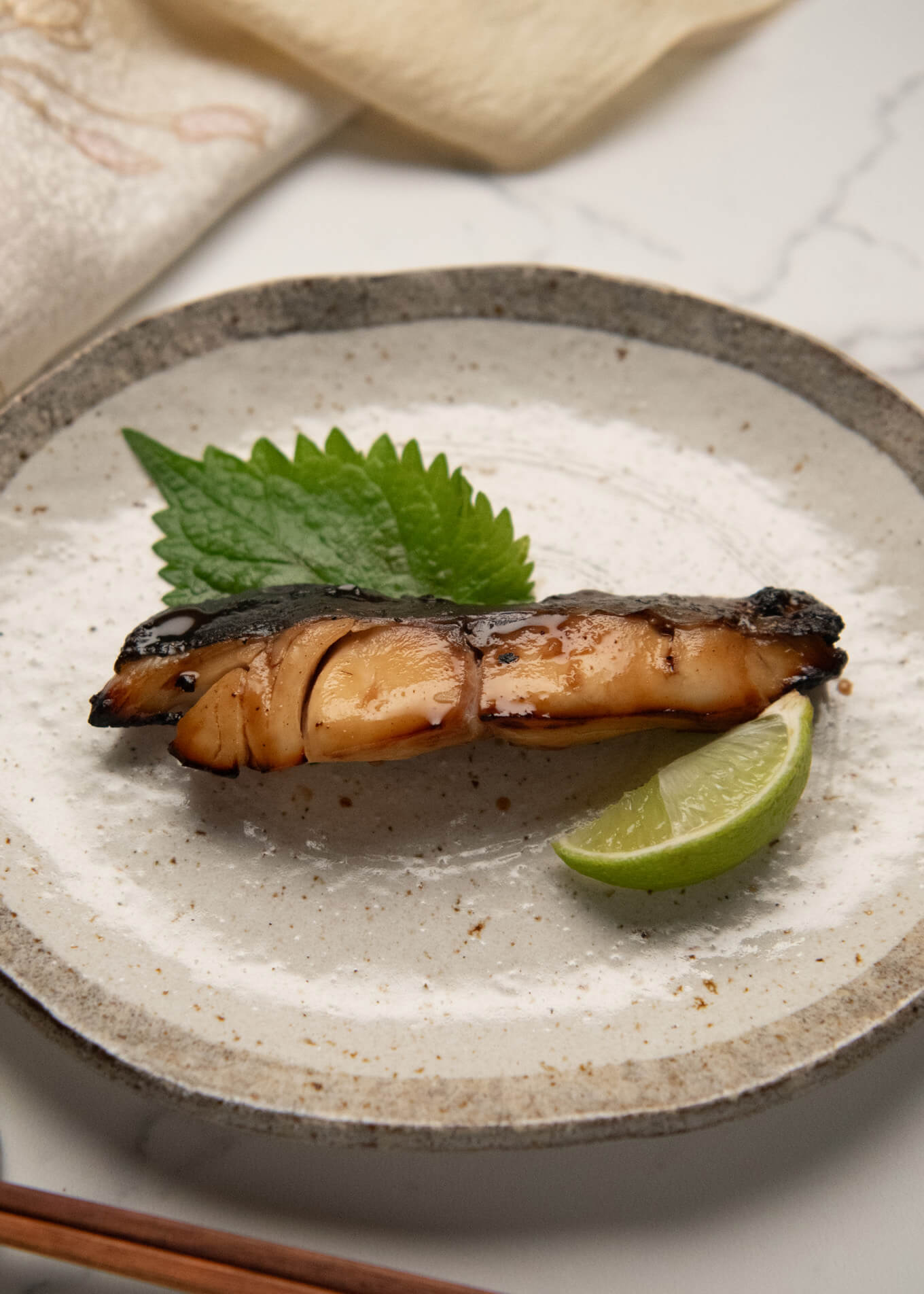 Hero shot of Yūan-style Grilled fish (Yūan Yaki fish).